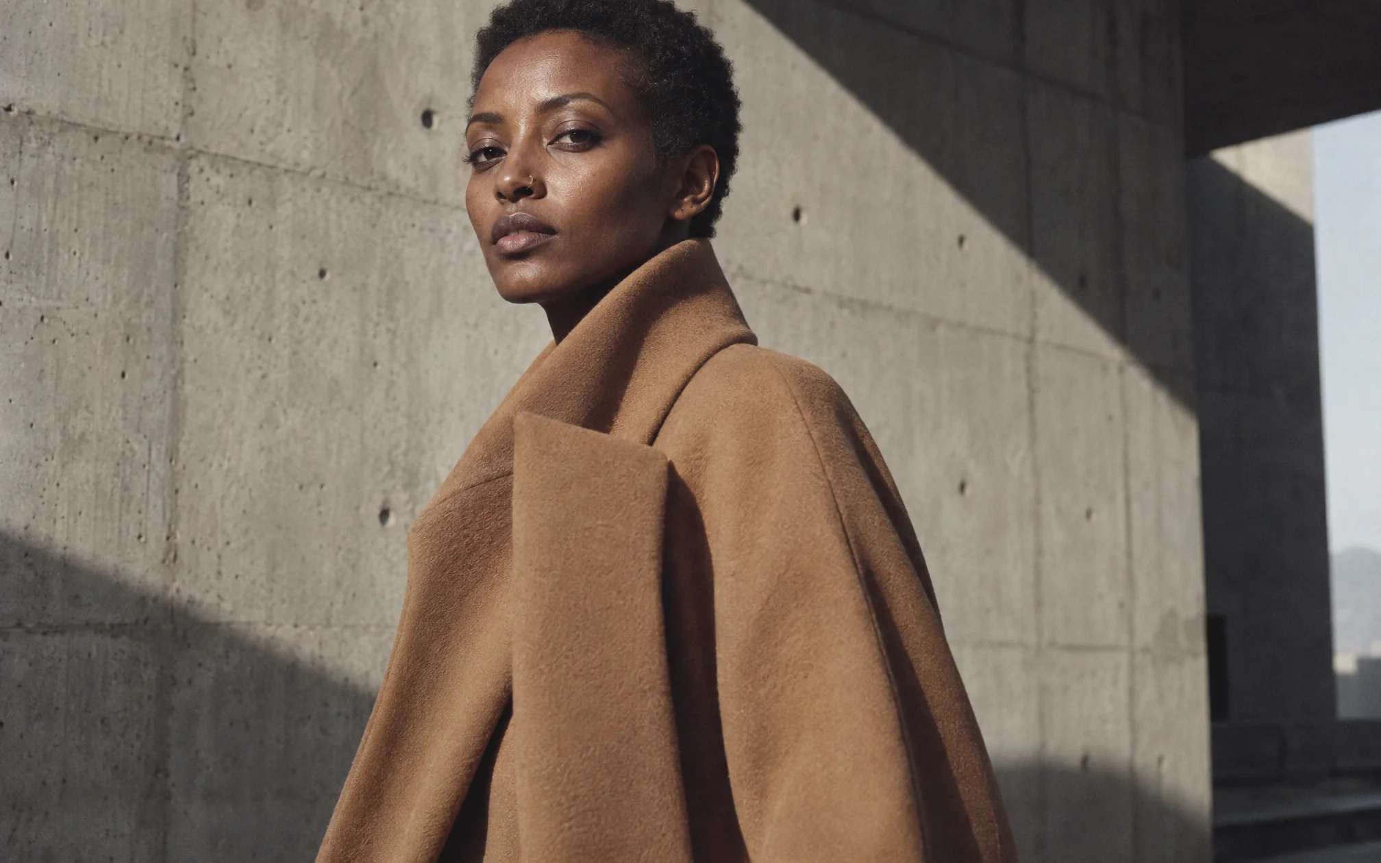 model wearing brutalist coat