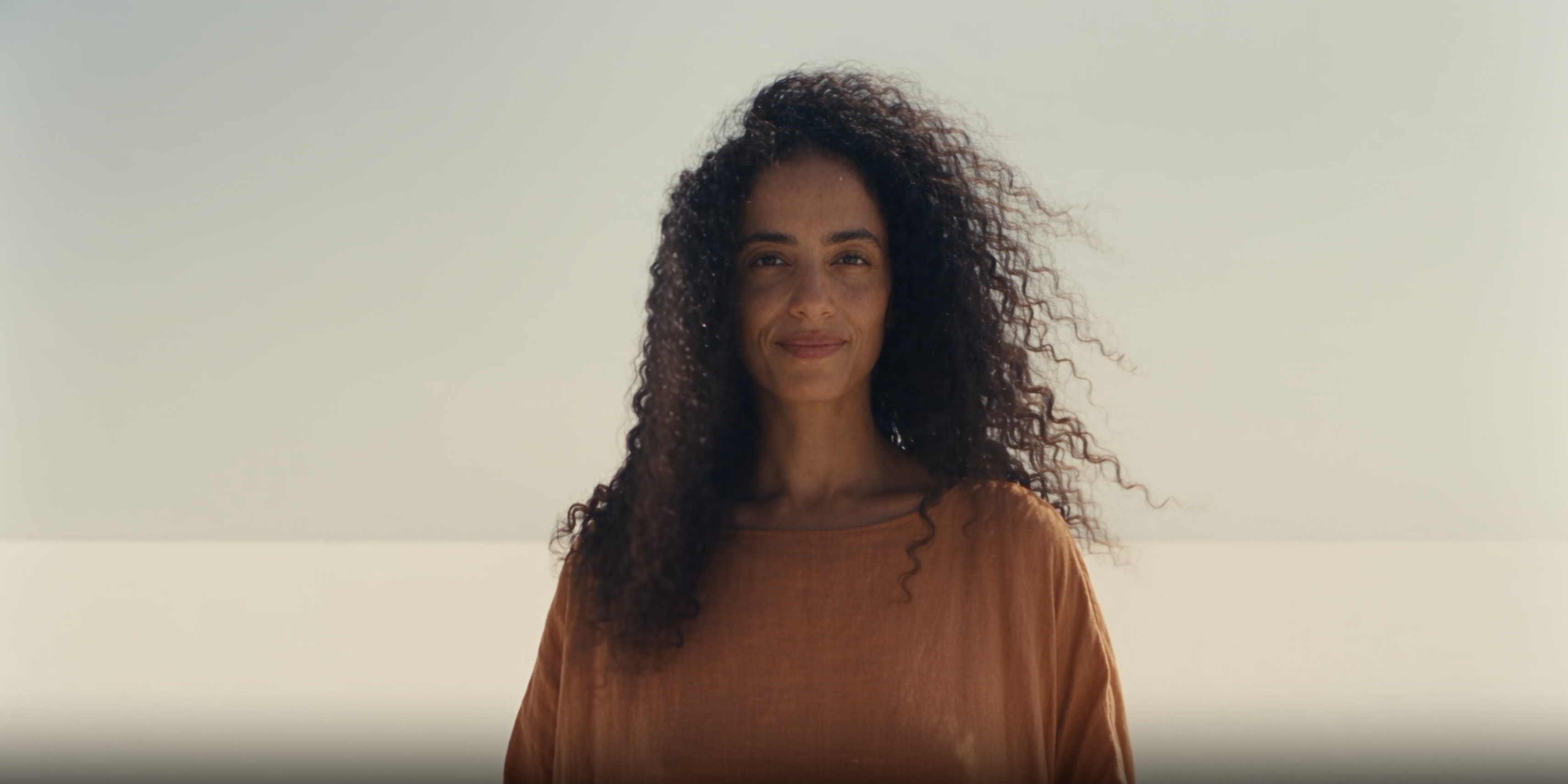 woman runs in the sand